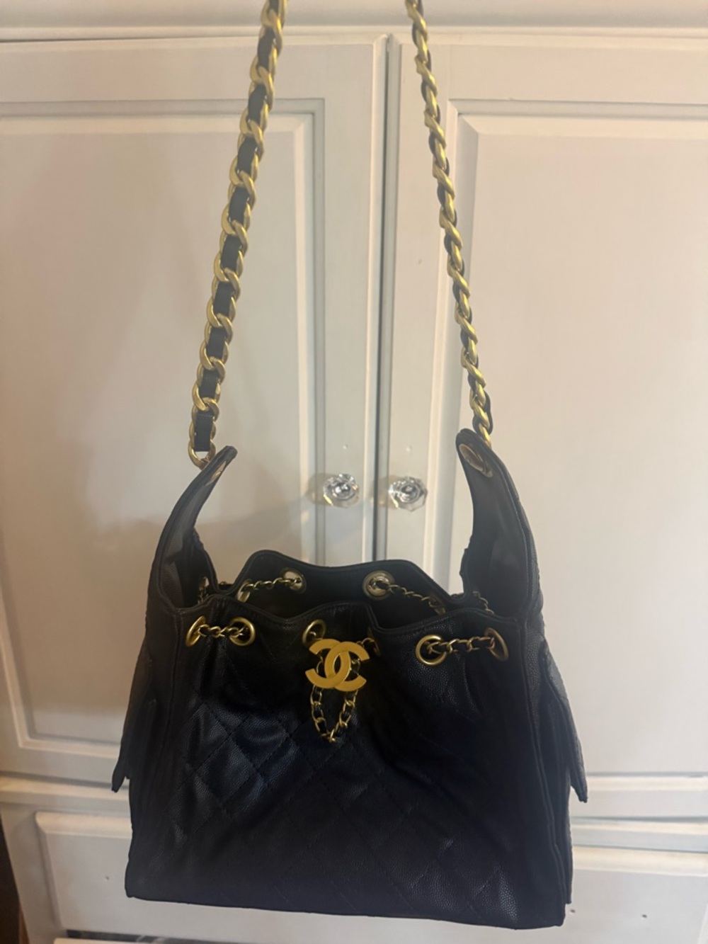 CC25 Black Quilted Drawstring Shoulder Bag with Gold Hardware